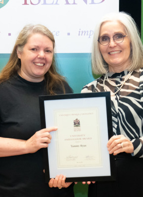 Tammy Ryan, Service Worker with UPEI Facilities Management, accepts the University Ambassador Award from Dr. Wendy Rodgers, UPEI President and Vice-Chancellor. Tammy Ryan, Service Worker with UPEI Facilities Management, accepts the University Ambassador Award from Dr. Wendy Rodgers, UPEI President and Vice-Chancellor.
