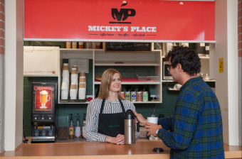Erica serves a customer