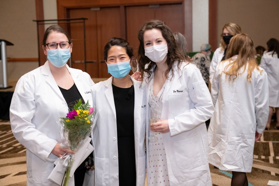 Drs. Zoe Rutledge, Kelly Yoo, and Marie-Andree Mercier celebrate at their White Coat ceremony in March. 