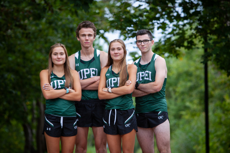 UPEI Cross Country Panthers (Grace Richard, Jack Roberts, Katie Richard and Riley Fitzpatrick) prepare to host the first-ever AUS championship this weekend