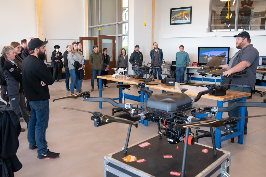 Luke Meloche, Remotely Piloted Aircraft System Pilot and Research Assistant at the UPEI Climate Lab provides information on lab’s fleet of drones to some of the Open House attendees