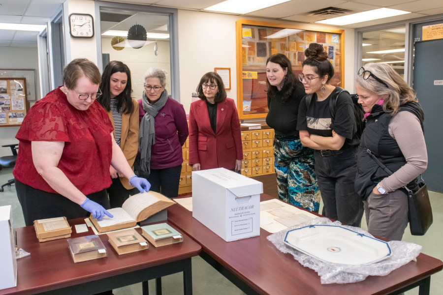 Senators view L.M. Montgomery holdings at Roberton Library.