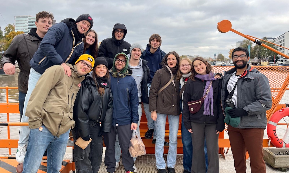 a group of students on a bridge in Finland