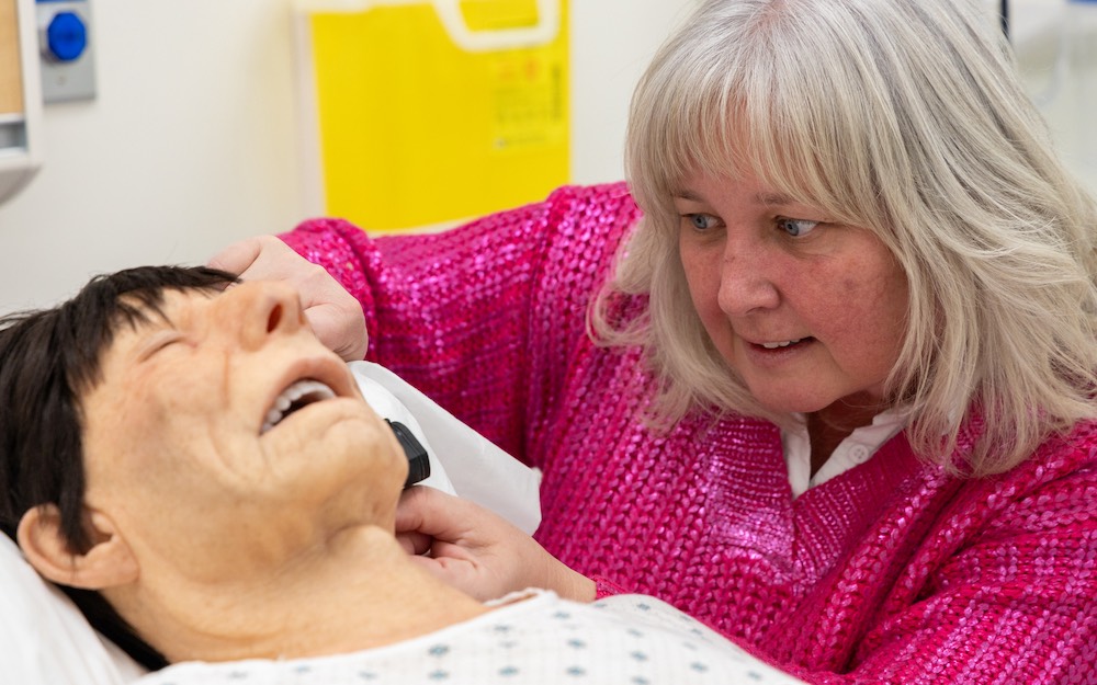 UPEI clinical instructor Valerie Reddin working with a simulation patient