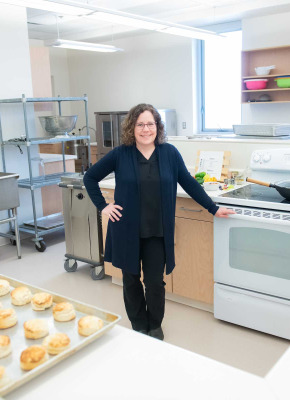 a dietitian in a commercial kitchen