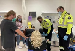 UPEI Nursing and Holland College Paramedicine students carrying out their roles in the "flu clinic" interprofessional simulation lab