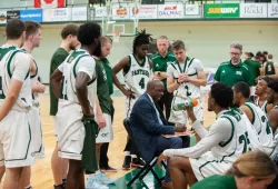 Head coach Darrell Glenn draws up a play during a timeout in an Oct. 29 game against Cape Breton.