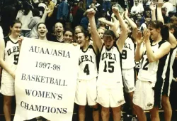 Eireann Rigby (#15) celebrates UPEI's 1997-98 AUAA championship with her teammates.