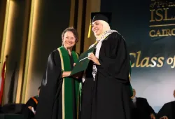 The Honourable Diane Griffin, Chancellor of UPEI pauses for a photo with a UPEI Cairo Campus graduate.
