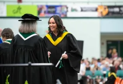 Lauren Reid, recipient of the Arlie Parks Scholarship, graduated with her Master of Science from UPEI in May 2025  Photo of woman receiving her degree at Convocation