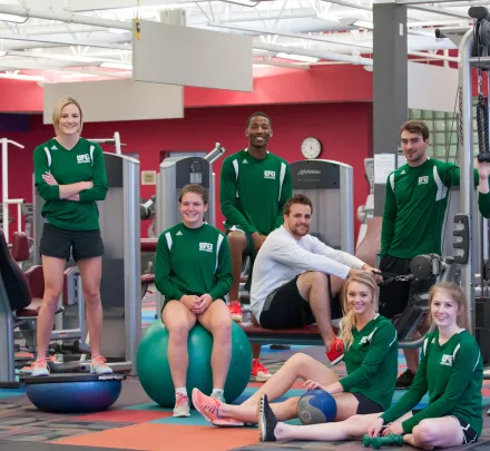 athletes stand in the gym