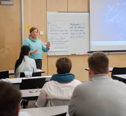 a professor leading a discussion