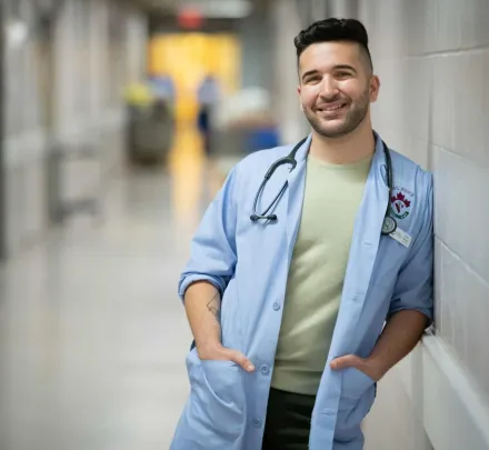 a smiling veterinary medicine student