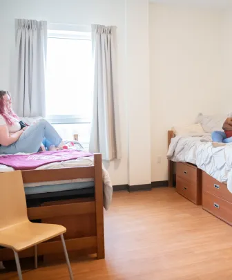 students in a UPEI residence room 