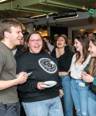 people laughing in the Fox and Crow at UPEI