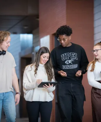 a group of students in UPEI's faculty of sustainable design engineering building