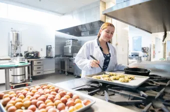 alex gallant-wood working in a kitchen laboratory