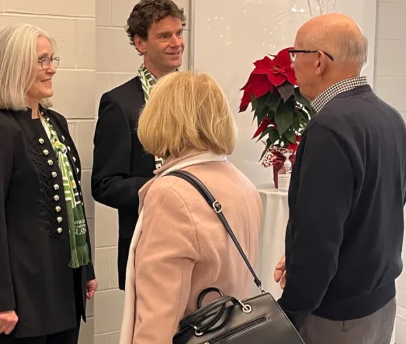 Dr. Wendy Rodgers, UPEI president and vice-chancellor, and Sjors Reijers, president of the UPEI Alumni Association, greet attendees at UPEI's 2025 New Year's Day Levee.