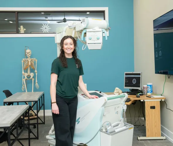 a radiographer in a clinical training lab